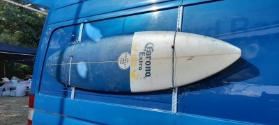 ViceTye securing a surfboard to a vehicle